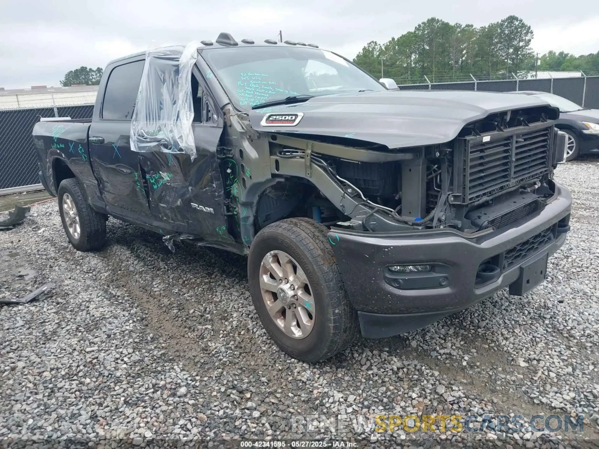1 Photograph of a damaged car 3C6UR5FL1MG561600 RAM 2500 2021