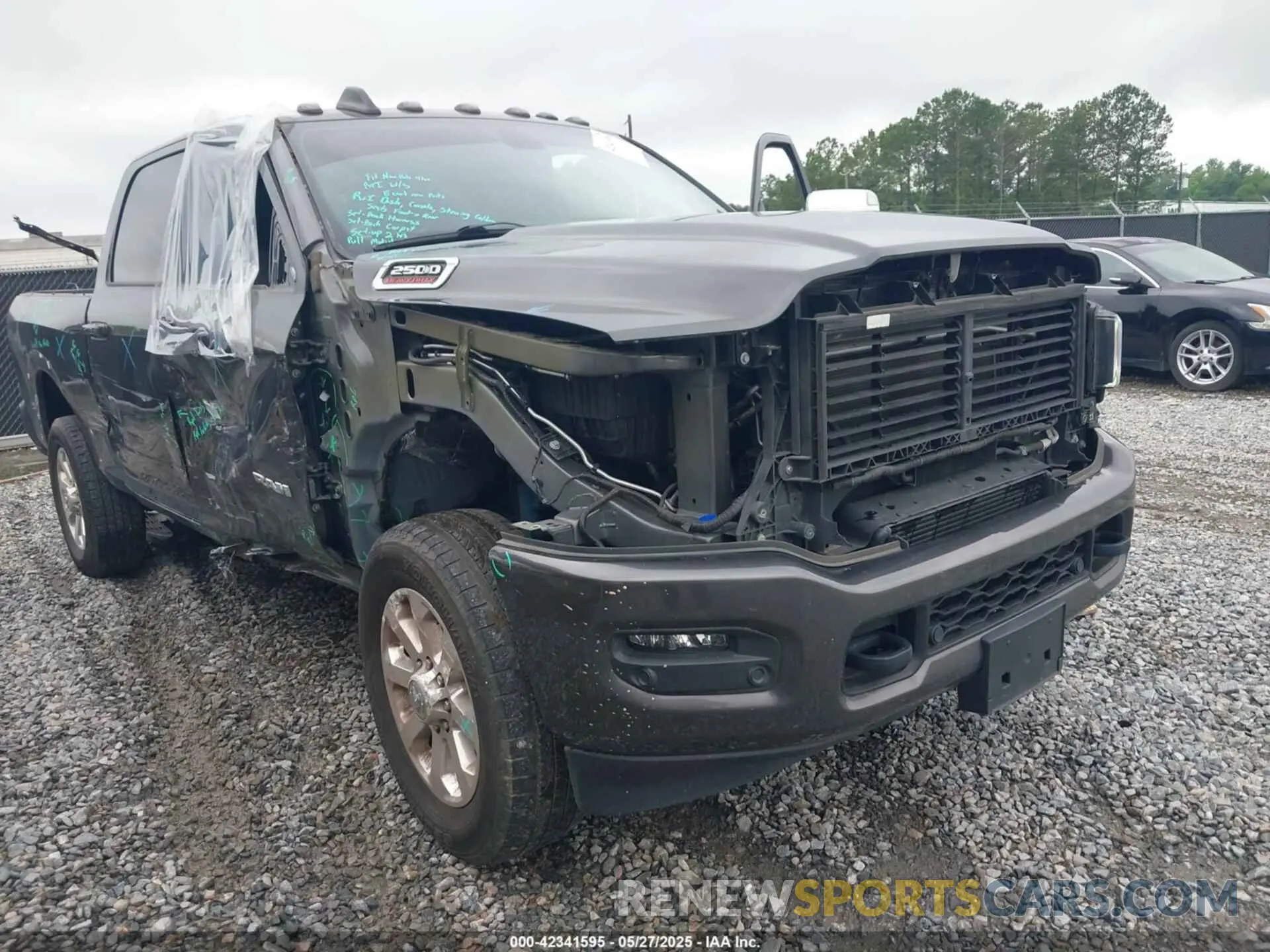 6 Photograph of a damaged car 3C6UR5FL1MG561600 RAM 2500 2021