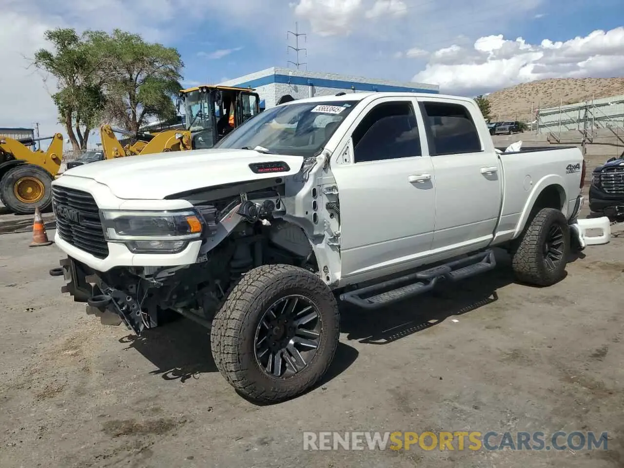 1 Photograph of a damaged car 3C6UR5FL2MG591673 RAM 2500 2021