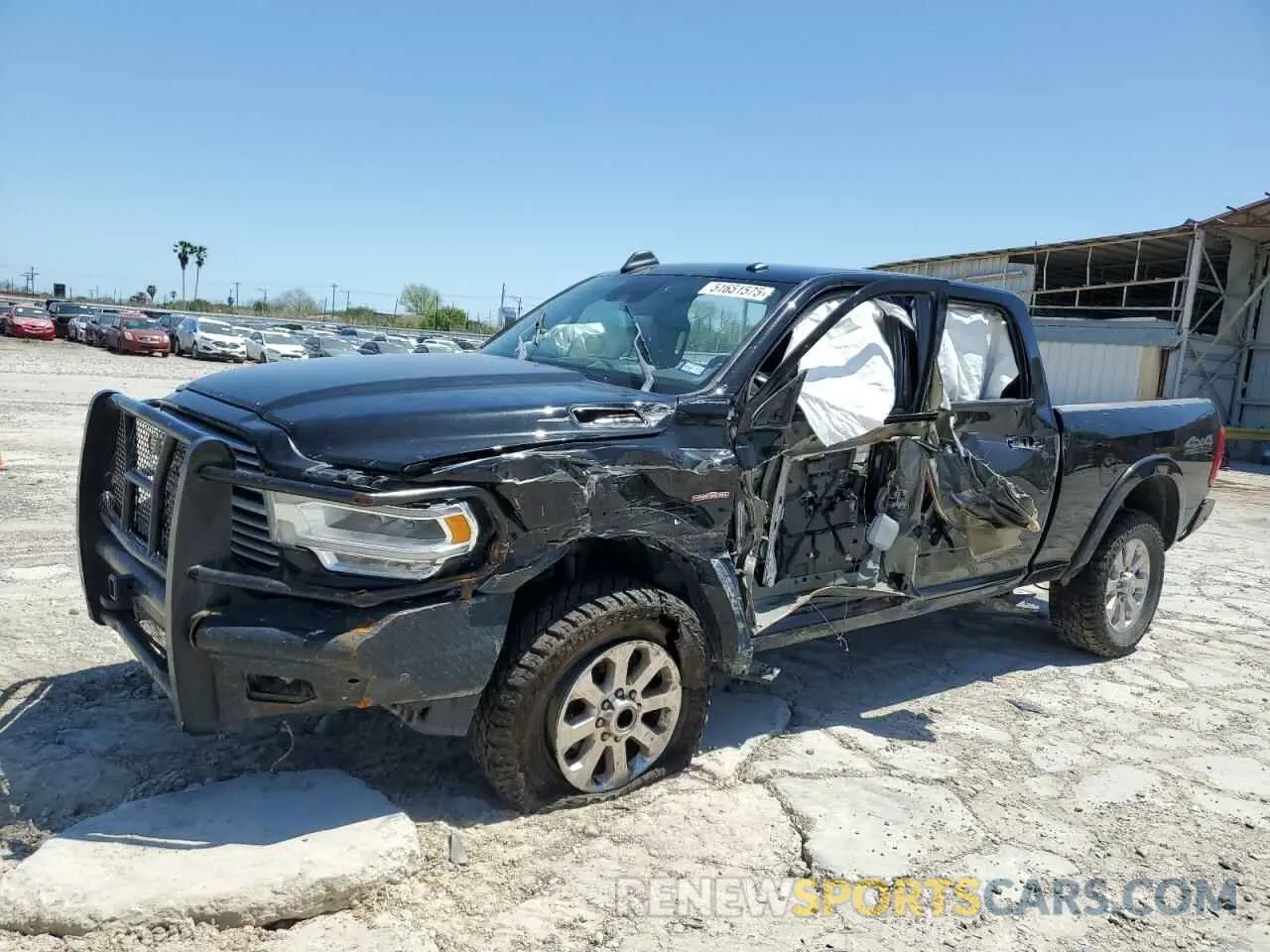 1 Photograph of a damaged car 3C6UR5FL2MG611033 RAM 2500 2021