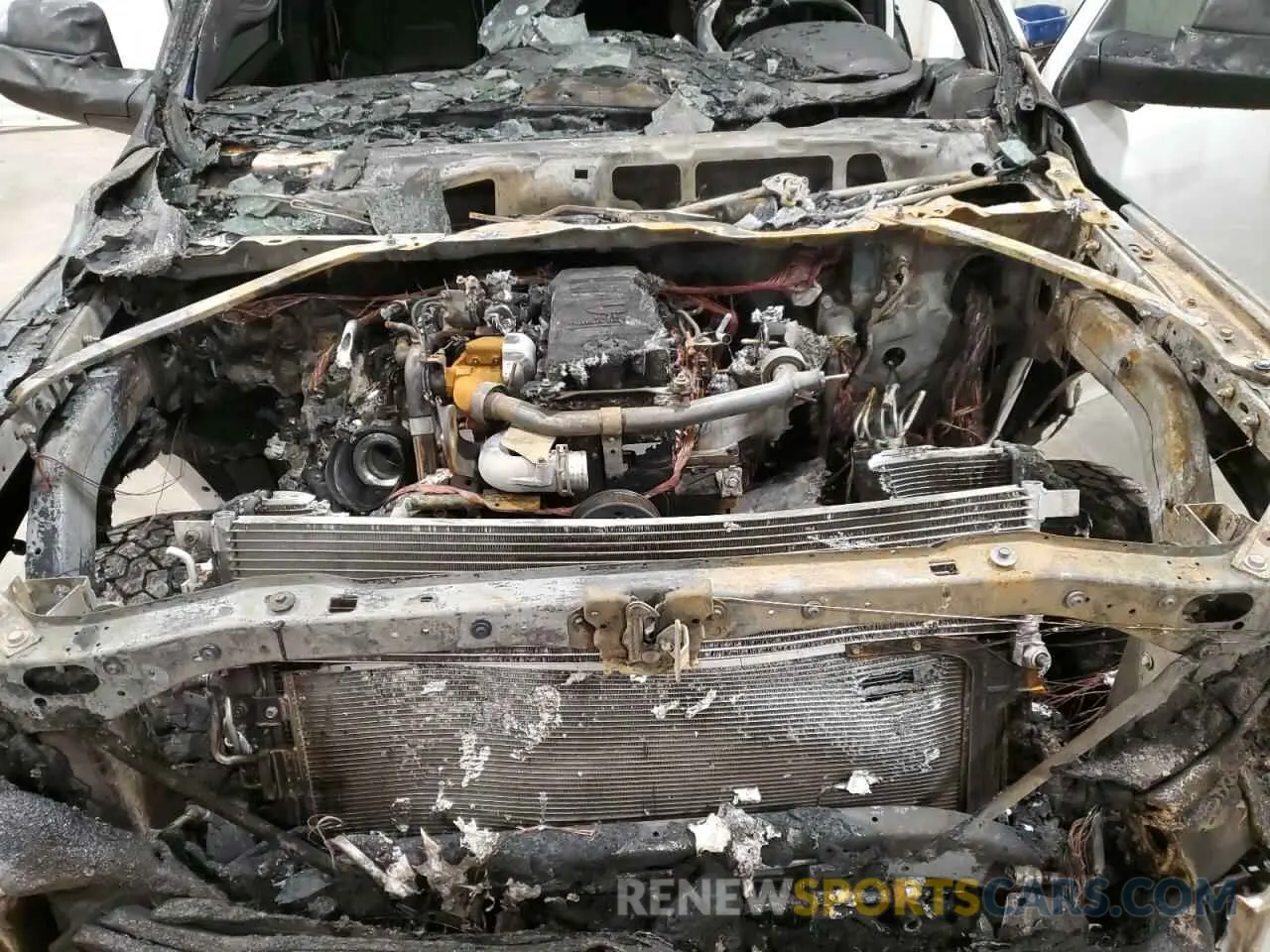11 Photograph of a damaged car 3C6UR5FL3MG502502 RAM 2500 2021