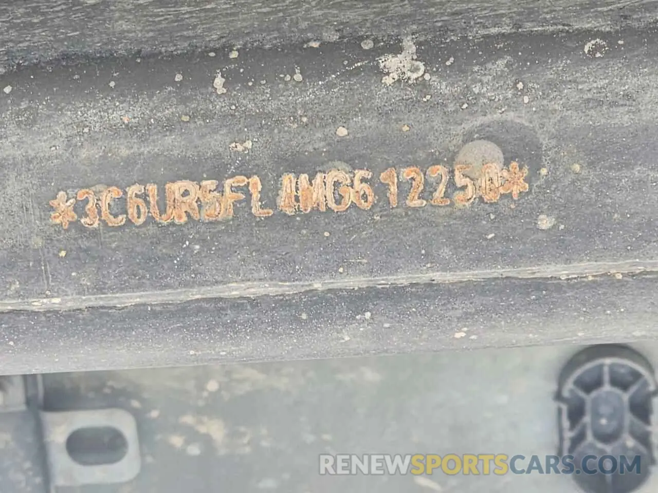 12 Photograph of a damaged car 3C6UR5FL4MG612250 RAM 2500 2021