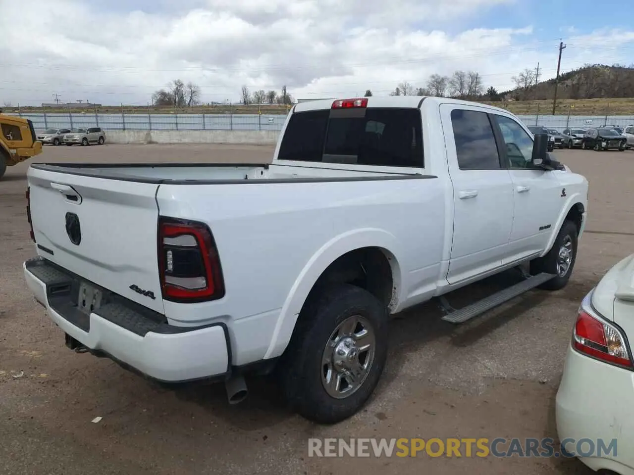 3 Photograph of a damaged car 3C6UR5FL4MG612250 RAM 2500 2021