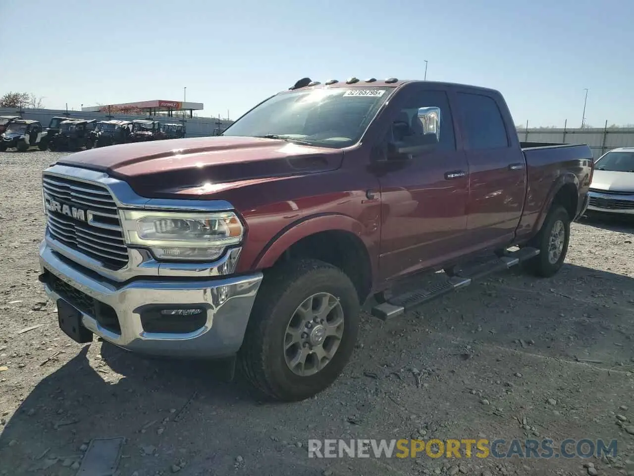 1 Photograph of a damaged car 3C6UR5FL4MG631655 RAM 2500 2021