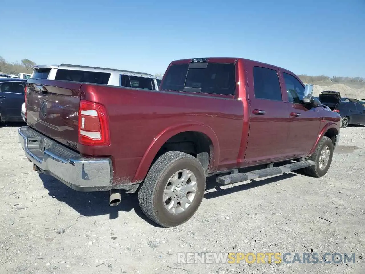 3 Photograph of a damaged car 3C6UR5FL4MG631655 RAM 2500 2021