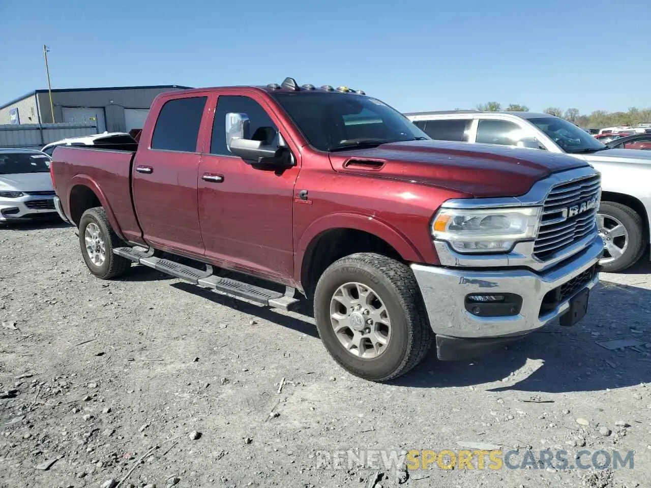 4 Photograph of a damaged car 3C6UR5FL4MG631655 RAM 2500 2021