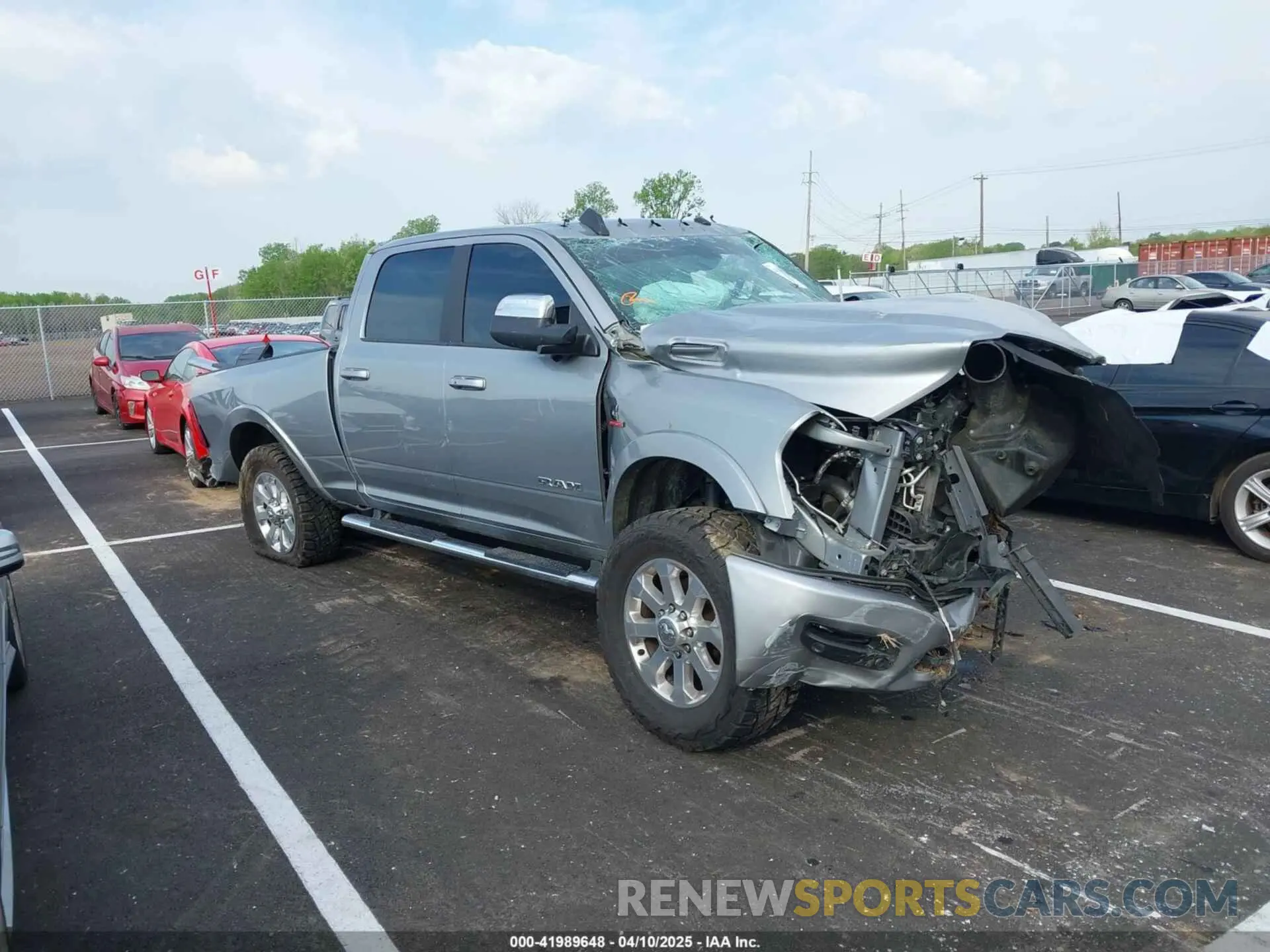 1 Photograph of a damaged car 3C6UR5FL5MG516837 RAM 2500 2021