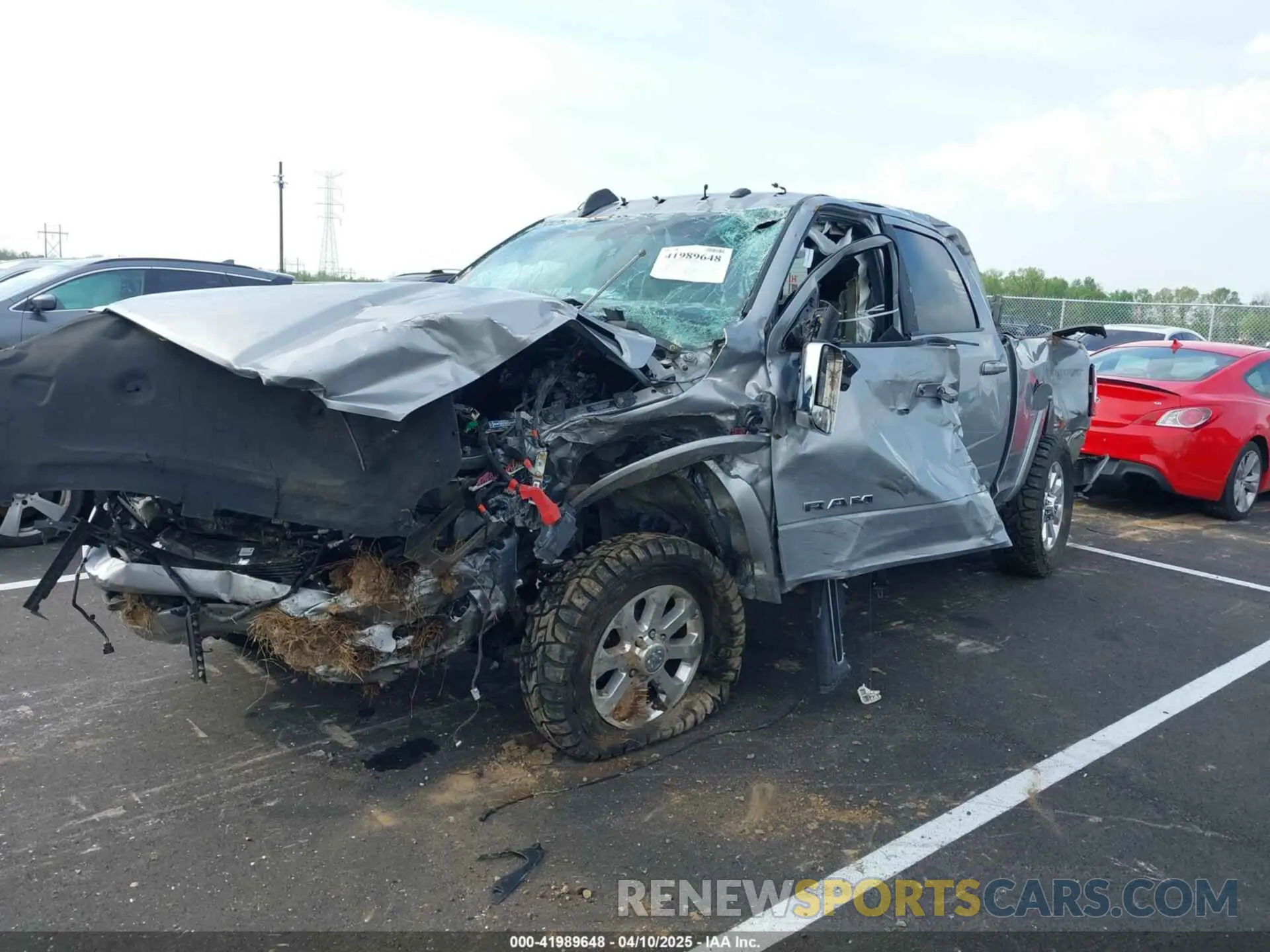 2 Photograph of a damaged car 3C6UR5FL5MG516837 RAM 2500 2021