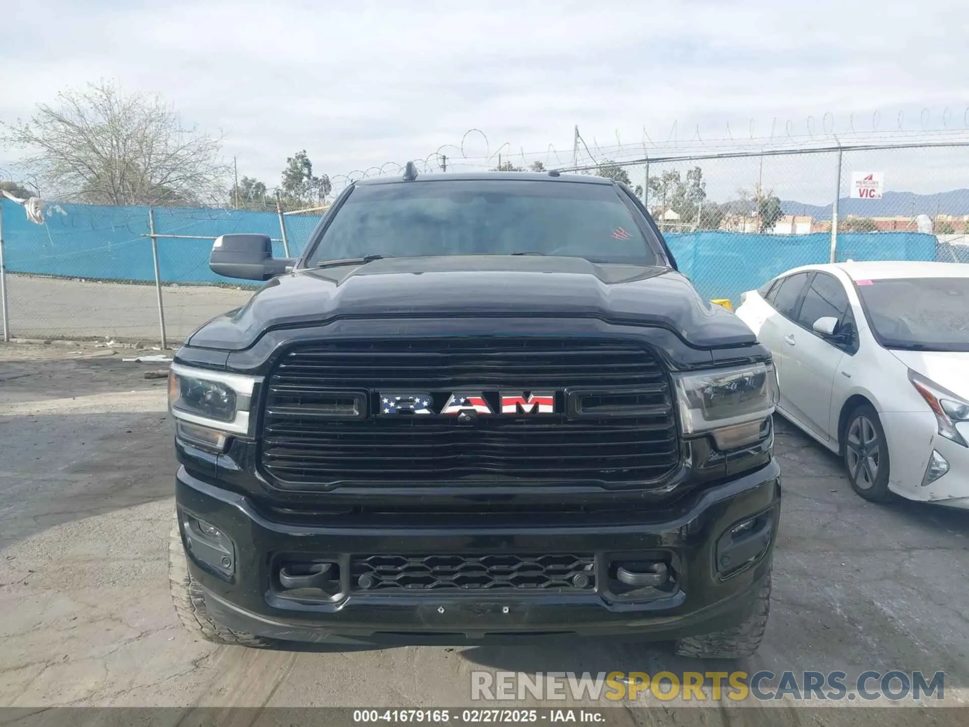 12 Photograph of a damaged car 3C6UR5FL7MG590681 RAM 2500 2021
