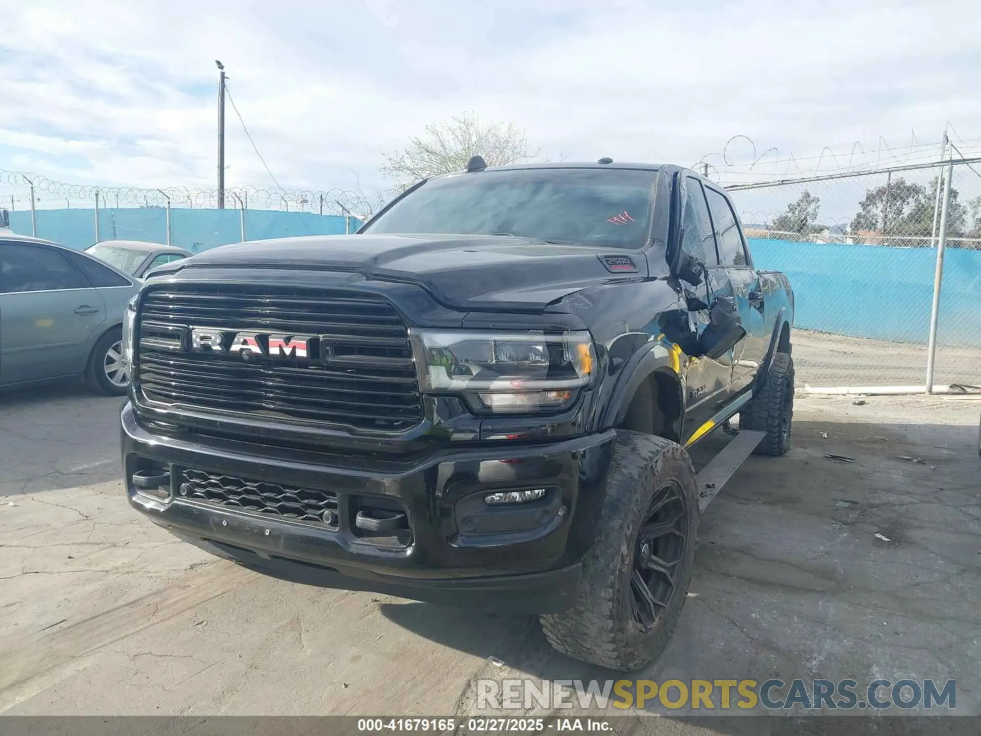 2 Photograph of a damaged car 3C6UR5FL7MG590681 RAM 2500 2021