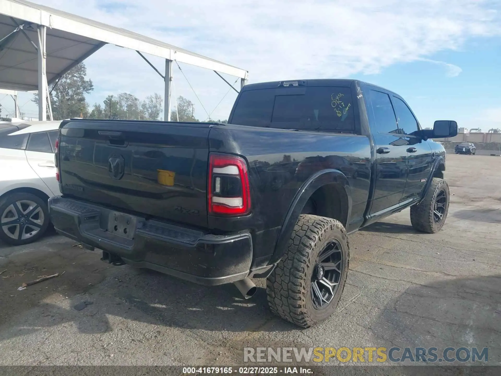 4 Photograph of a damaged car 3C6UR5FL7MG590681 RAM 2500 2021