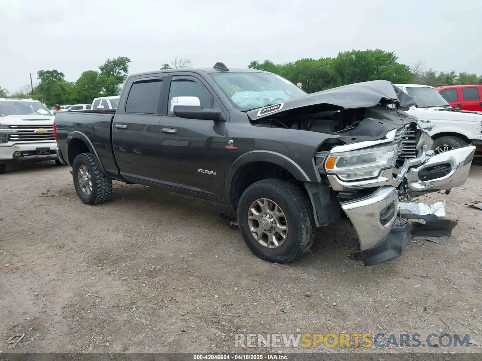1 Photograph of a damaged car 3C6UR5FL7MG612467 RAM 2500 2021