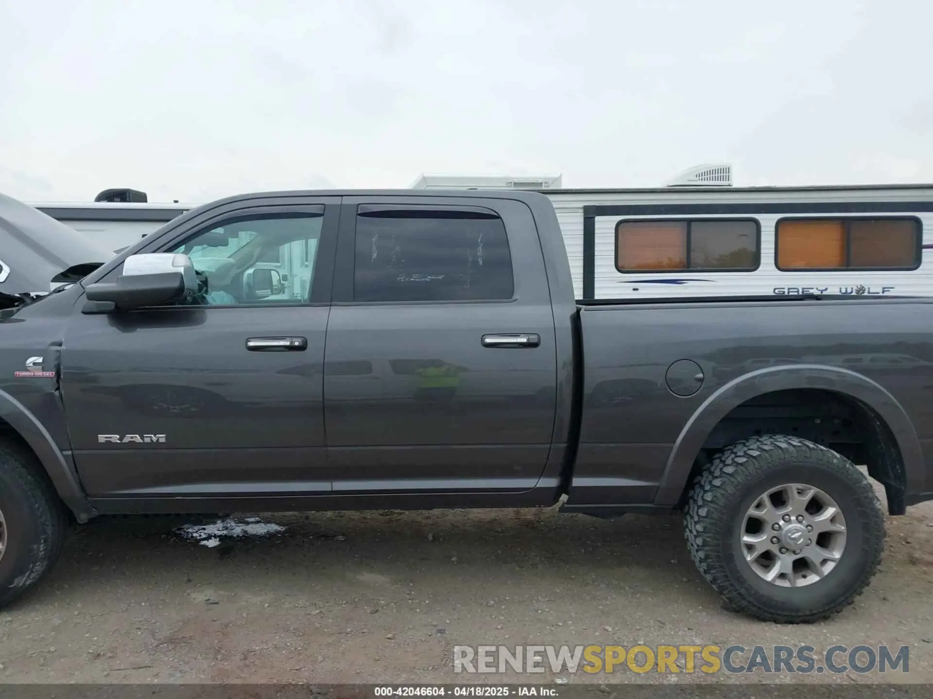 14 Photograph of a damaged car 3C6UR5FL7MG612467 RAM 2500 2021