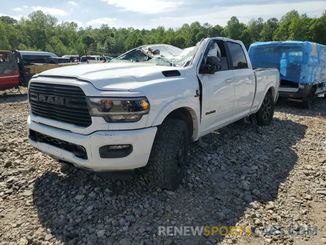 1 Photograph of a damaged car 3C6UR5FL8MG534877 RAM 2500 2021