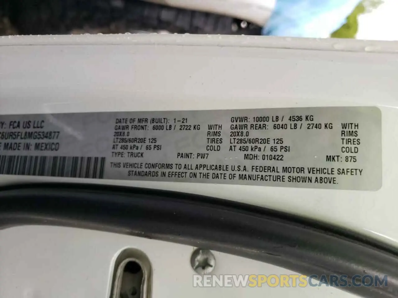 12 Photograph of a damaged car 3C6UR5FL8MG534877 RAM 2500 2021