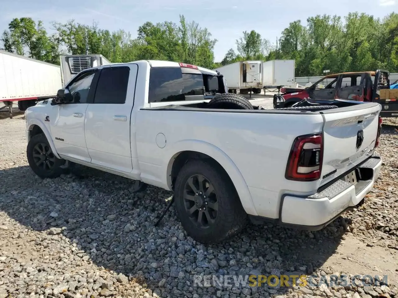 2 Photograph of a damaged car 3C6UR5FL8MG534877 RAM 2500 2021