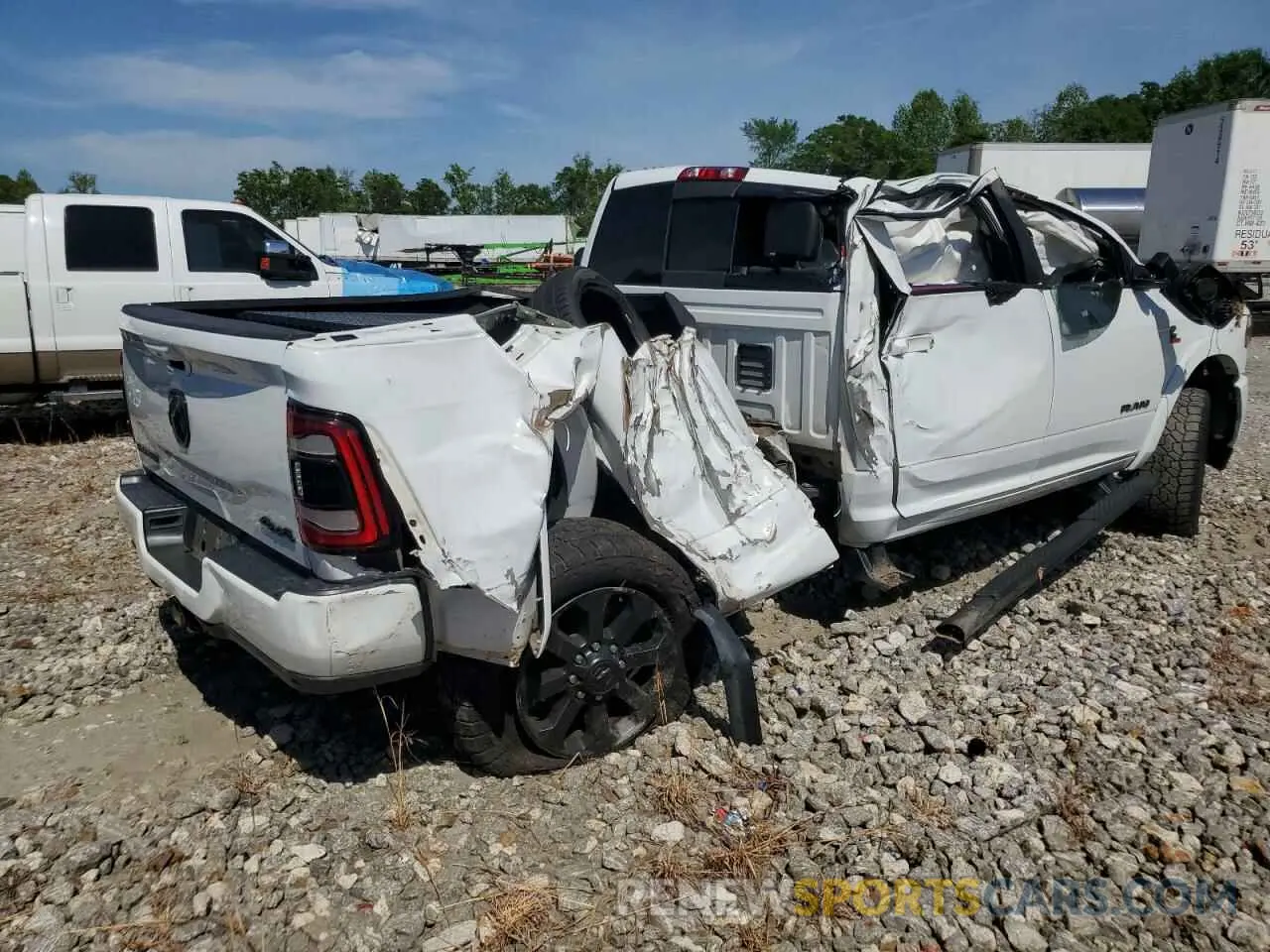 3 Photograph of a damaged car 3C6UR5FL8MG534877 RAM 2500 2021