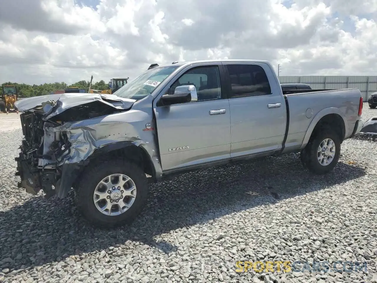 1 Photograph of a damaged car 3C6UR5FL8MG675819 RAM 2500 2021