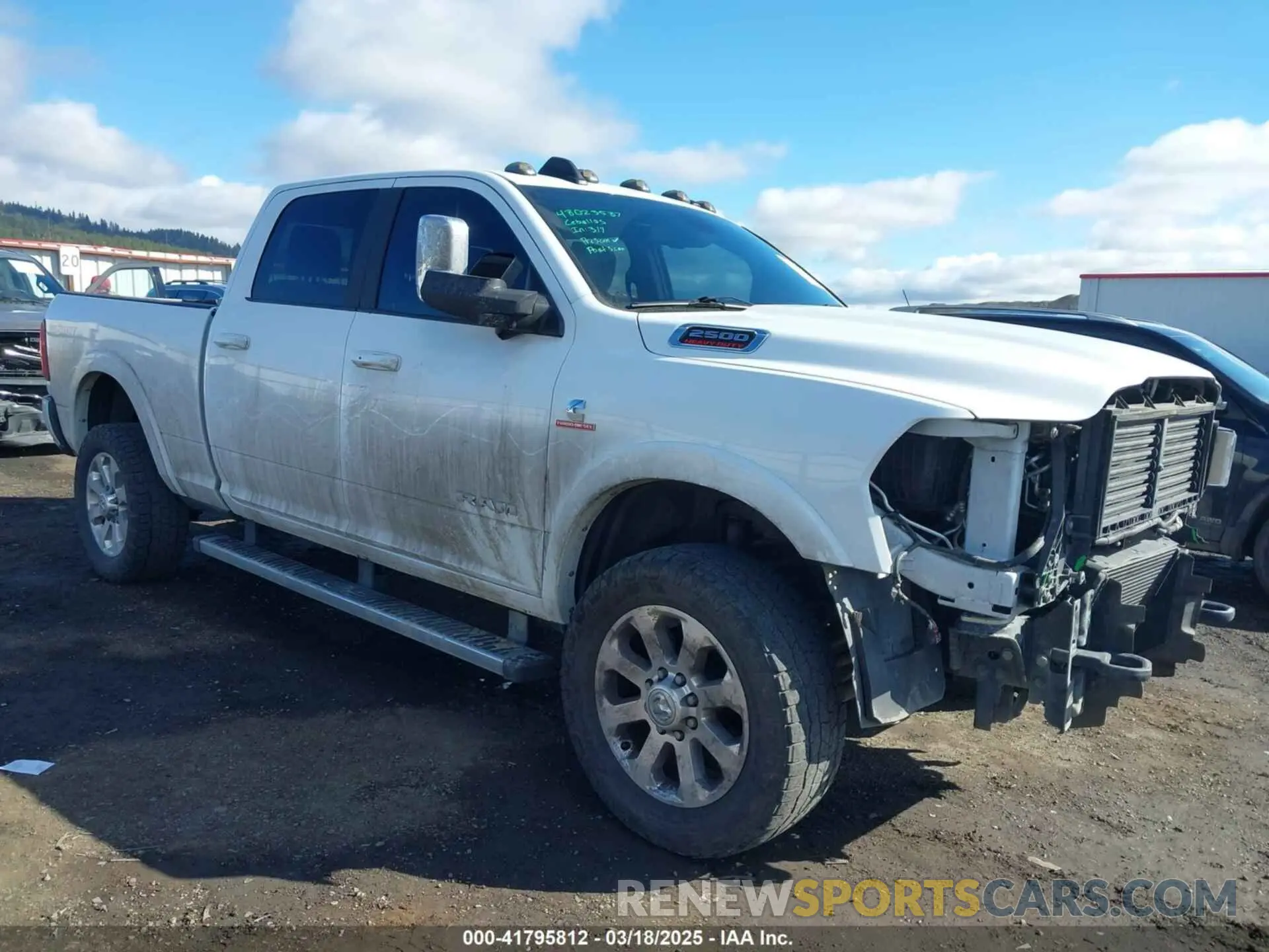 1 Photograph of a damaged car 3C6UR5FL9MG520549 RAM 2500 2021