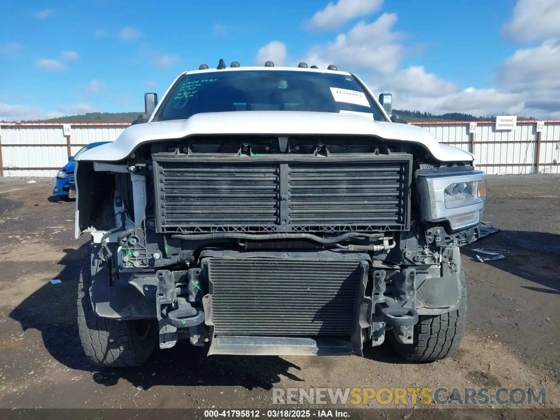 13 Photograph of a damaged car 3C6UR5FL9MG520549 RAM 2500 2021