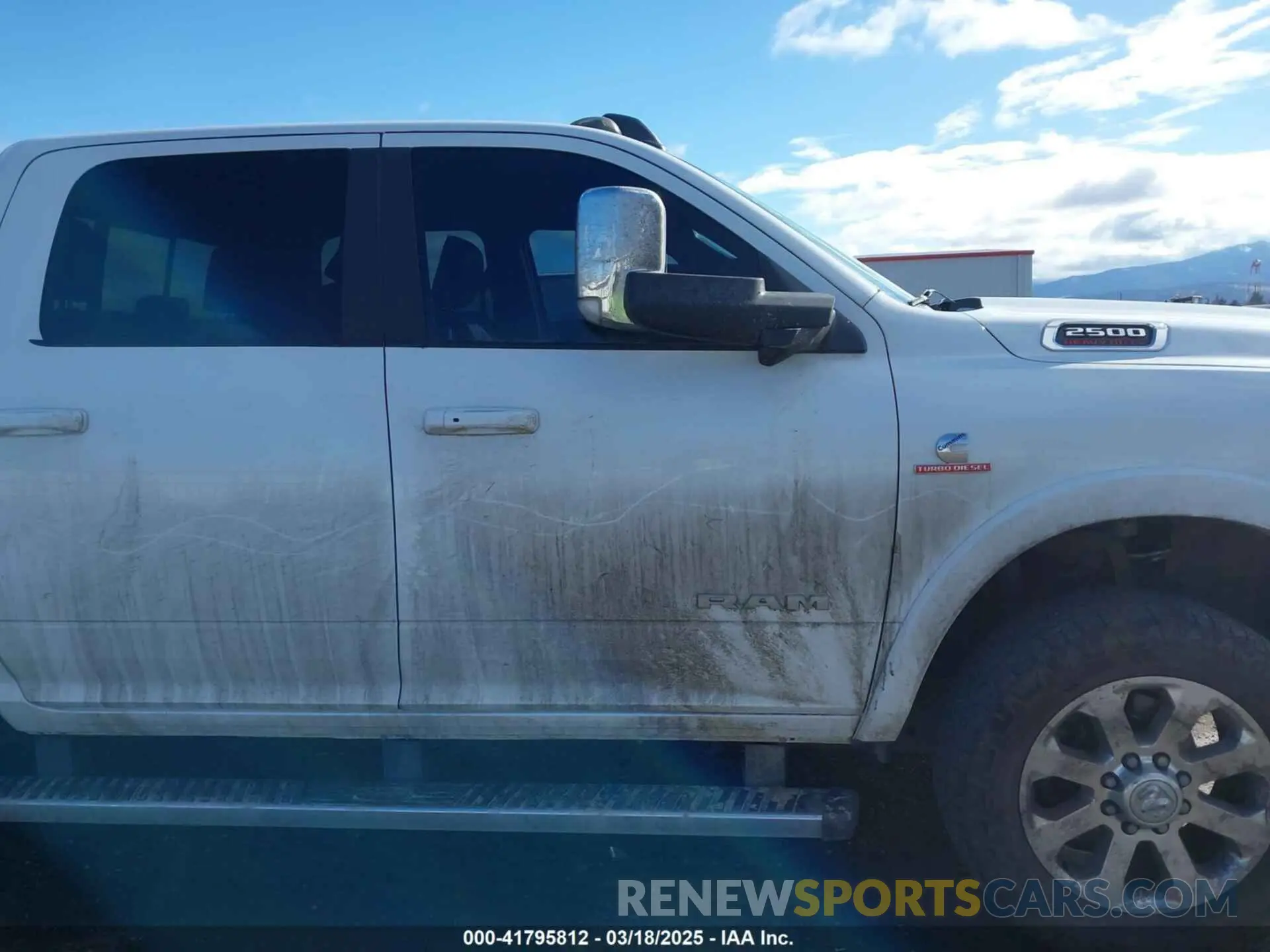 14 Photograph of a damaged car 3C6UR5FL9MG520549 RAM 2500 2021