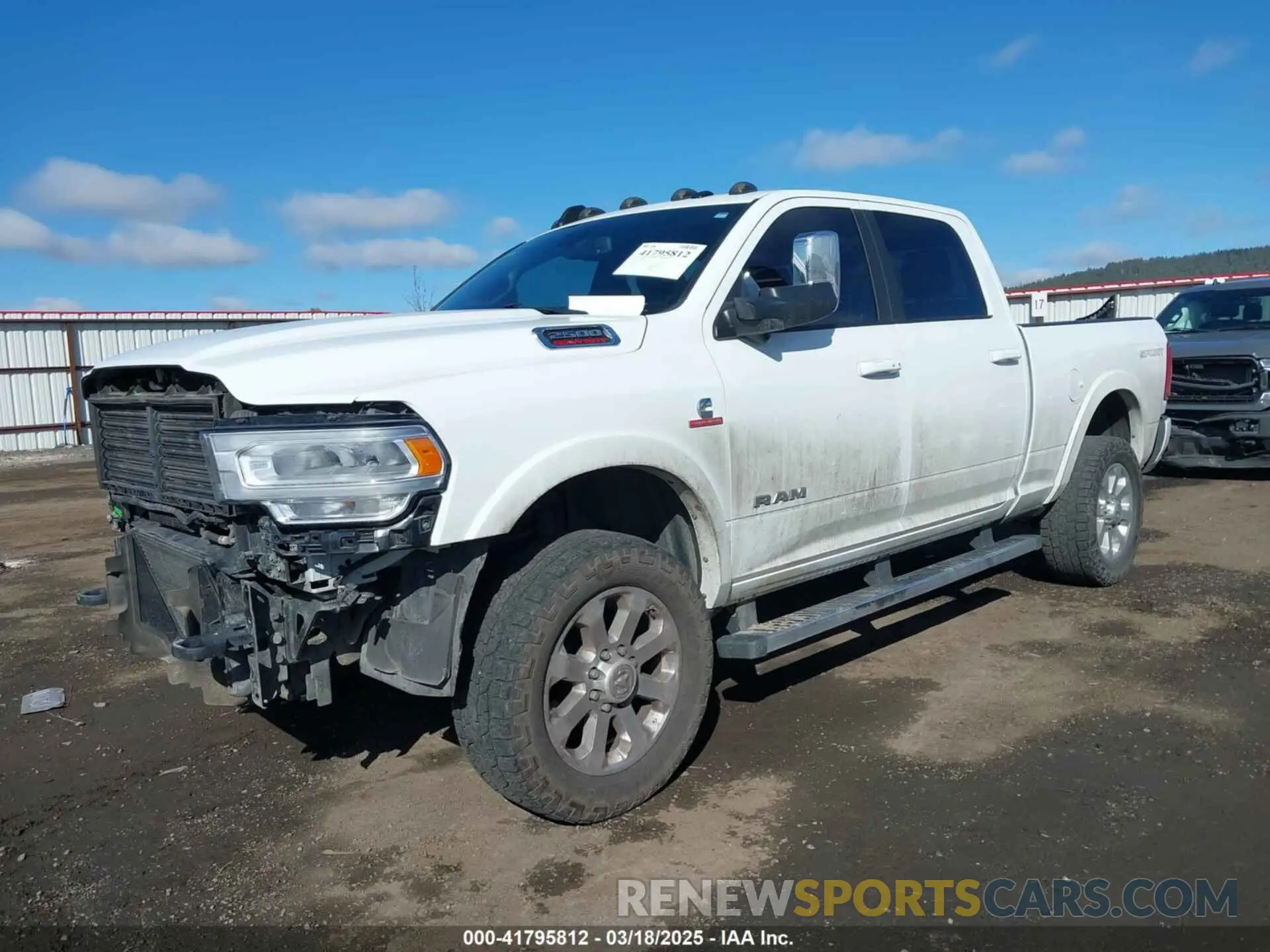 2 Photograph of a damaged car 3C6UR5FL9MG520549 RAM 2500 2021