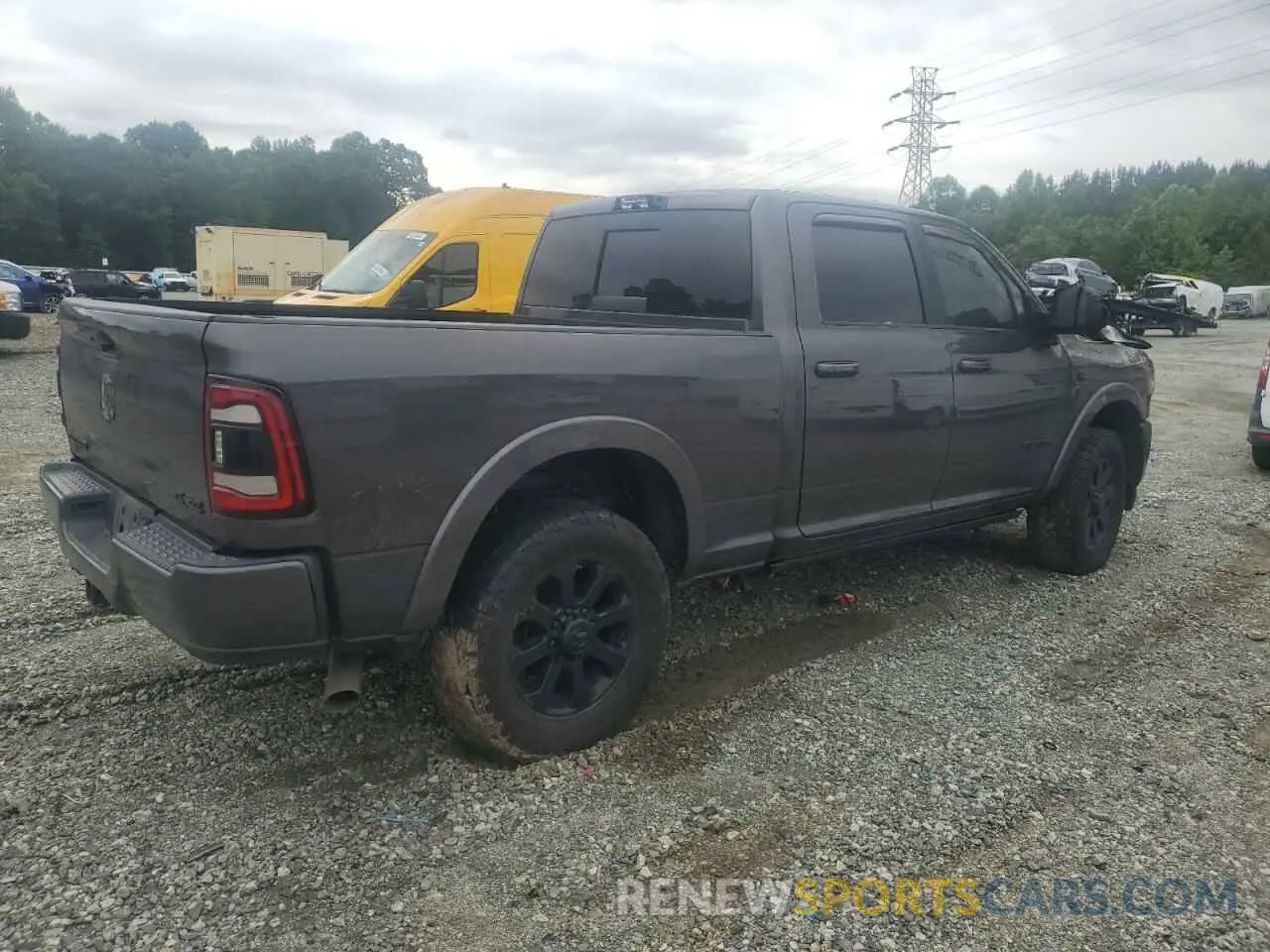 3 Photograph of a damaged car 3C6UR5FL9MG576488 RAM 2500 2021
