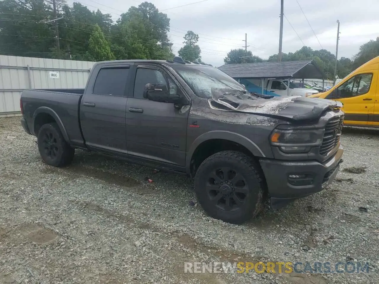 4 Photograph of a damaged car 3C6UR5FL9MG576488 RAM 2500 2021
