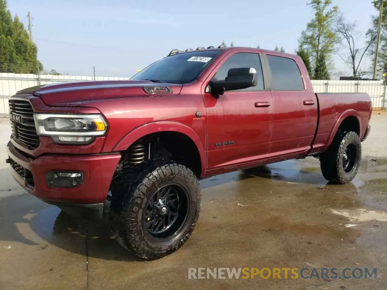 1 Photograph of a damaged car 3C6UR5FL9MG581092 RAM 2500 2021
