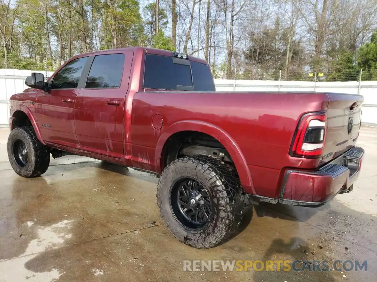 2 Photograph of a damaged car 3C6UR5FL9MG581092 RAM 2500 2021