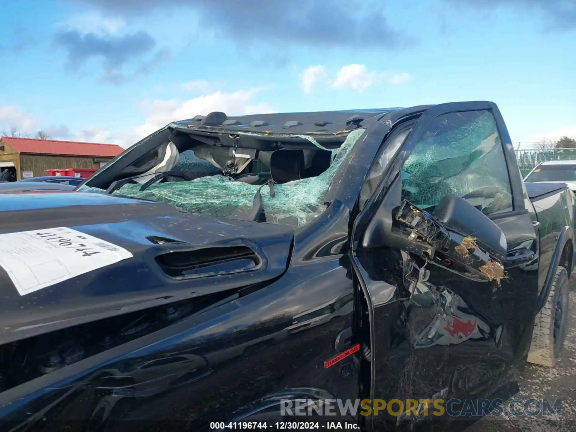 12 Photograph of a damaged car 3C6UR5FL9MG581156 RAM 2500 2021