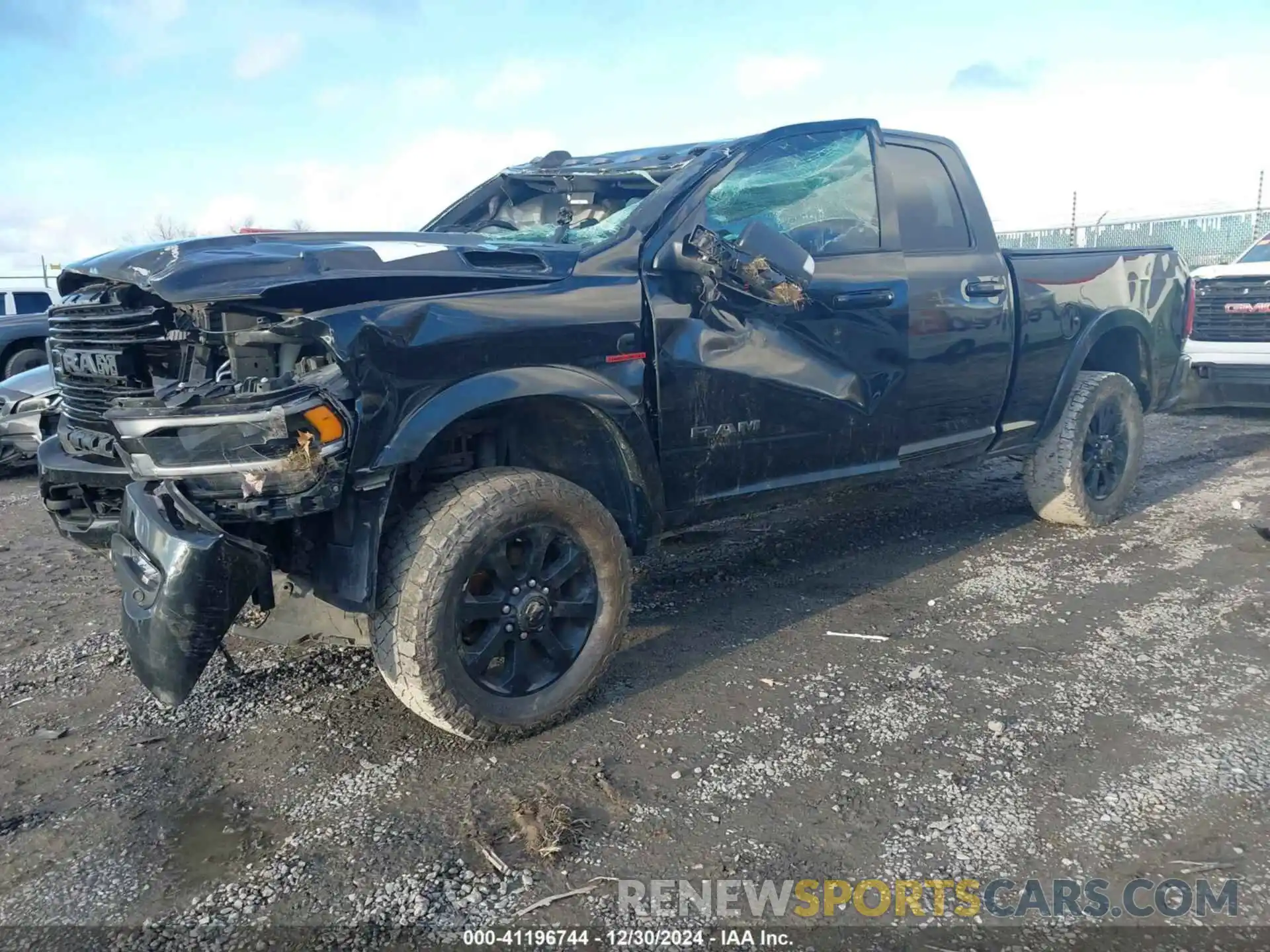 2 Photograph of a damaged car 3C6UR5FL9MG581156 RAM 2500 2021