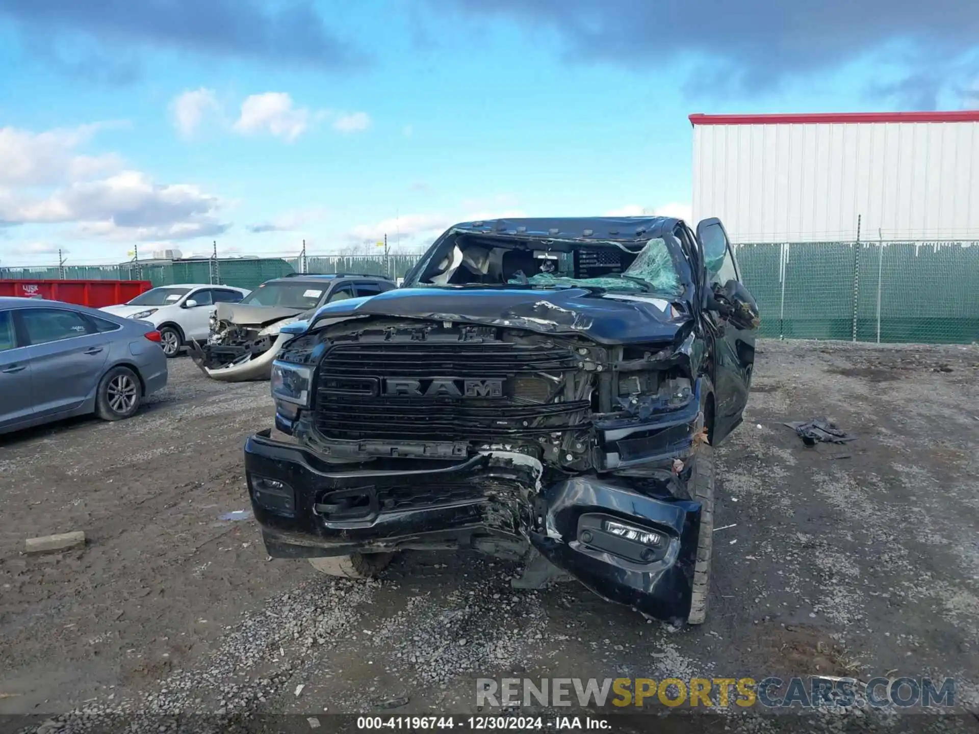 6 Photograph of a damaged car 3C6UR5FL9MG581156 RAM 2500 2021