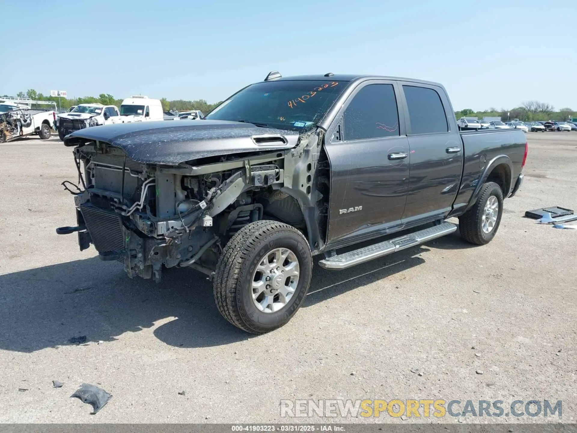 2 Photograph of a damaged car 3C6UR5FLXMG630400 RAM 2500 2021