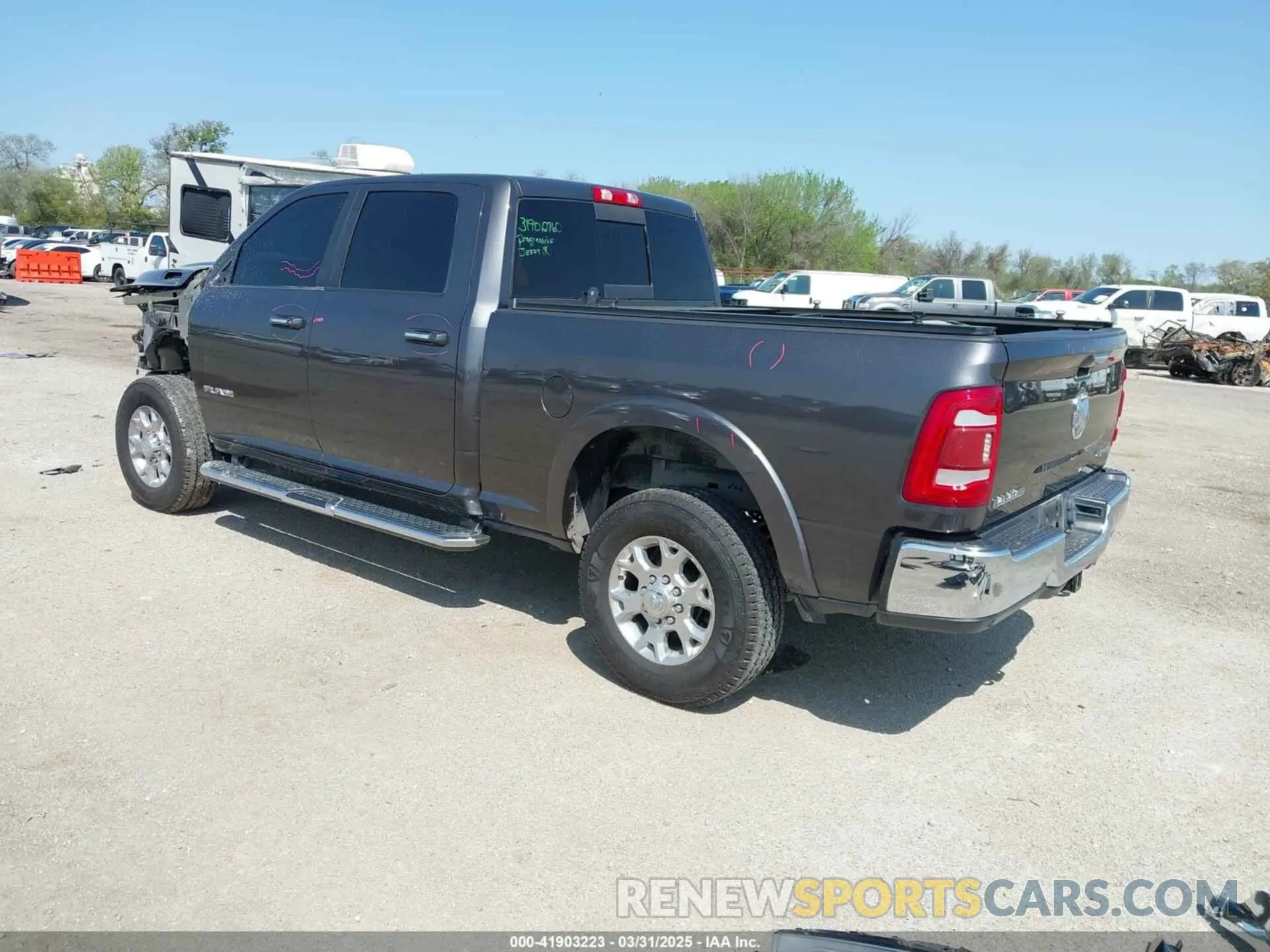 3 Photograph of a damaged car 3C6UR5FLXMG630400 RAM 2500 2021