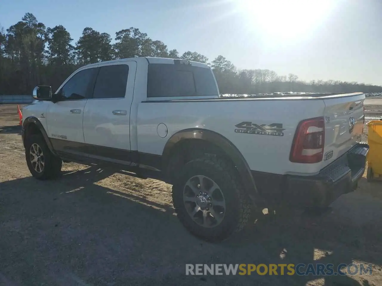 2 Photograph of a damaged car 3C6UR5GL6MG520314 RAM 2500 2021