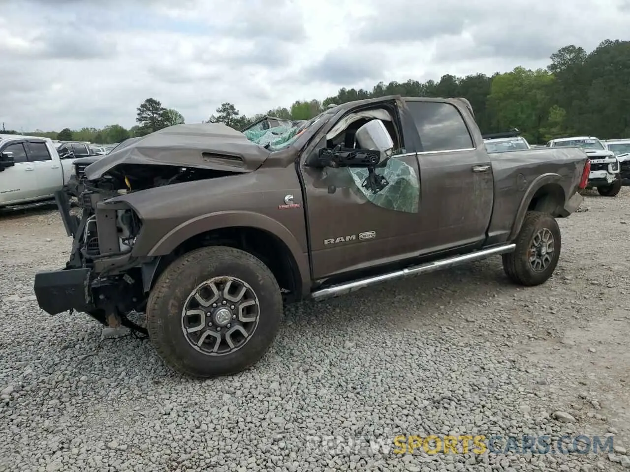 1 Photograph of a damaged car 3C6UR5GL6MG624236 RAM 2500 2021