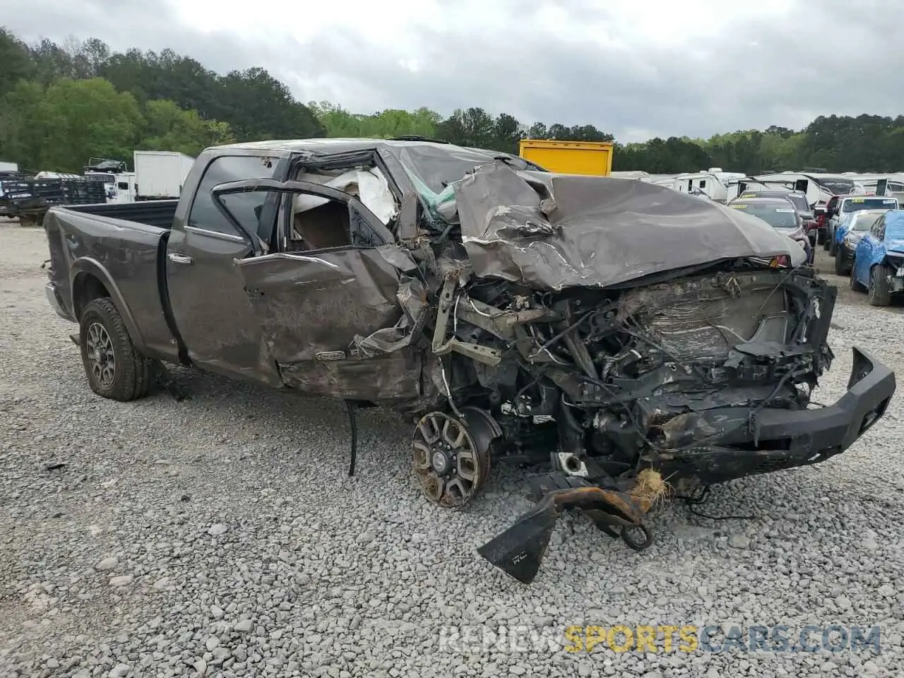 4 Photograph of a damaged car 3C6UR5GL6MG624236 RAM 2500 2021