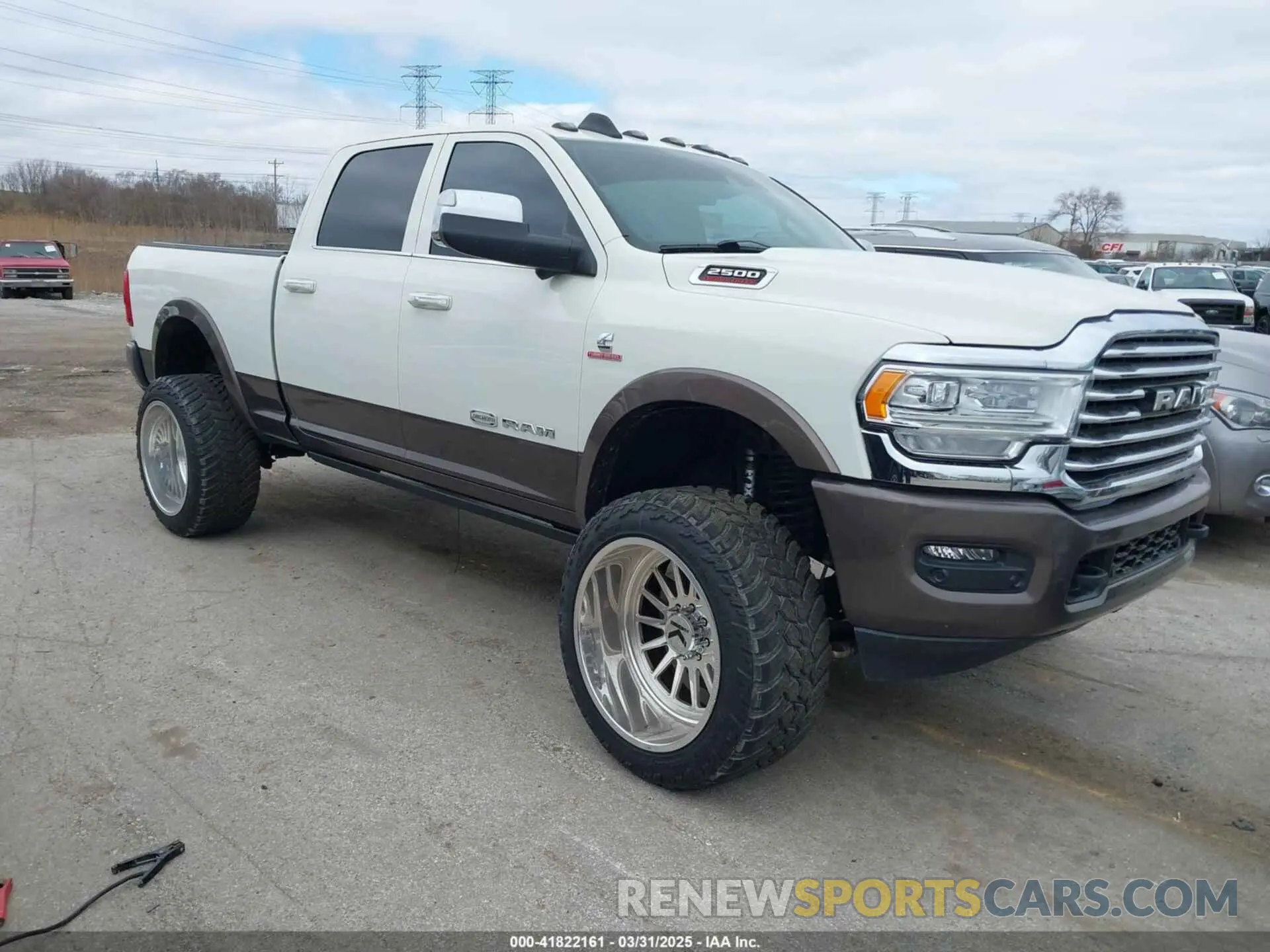1 Photograph of a damaged car 3C6UR5GL7MG557307 RAM 2500 2021