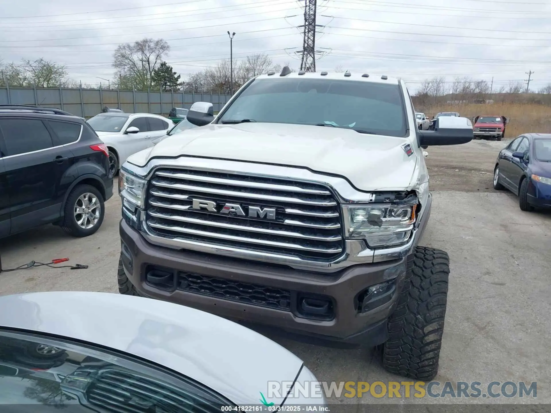 12 Photograph of a damaged car 3C6UR5GL7MG557307 RAM 2500 2021