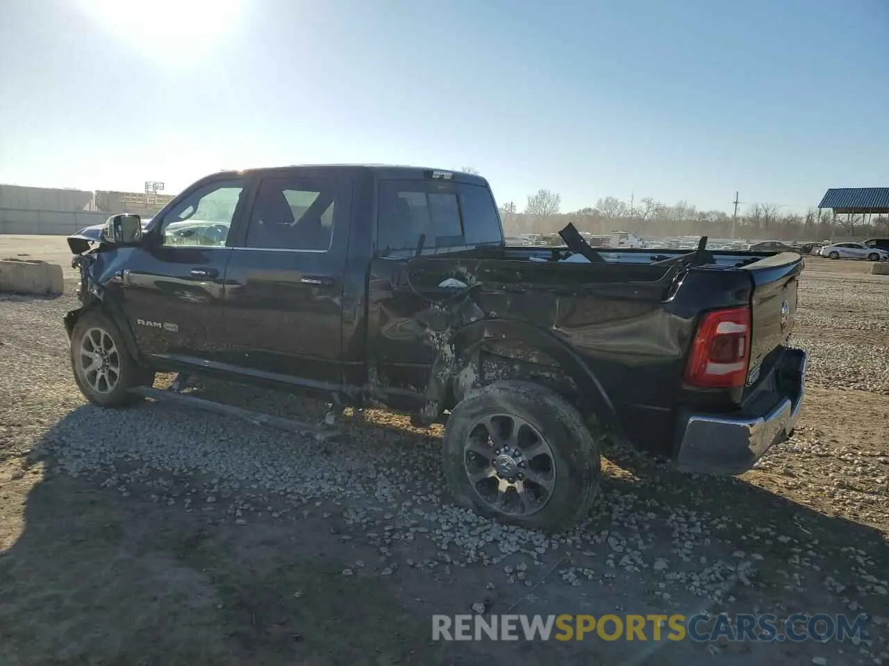 2 Photograph of a damaged car 3C6UR5GL8MG582023 RAM 2500 2021