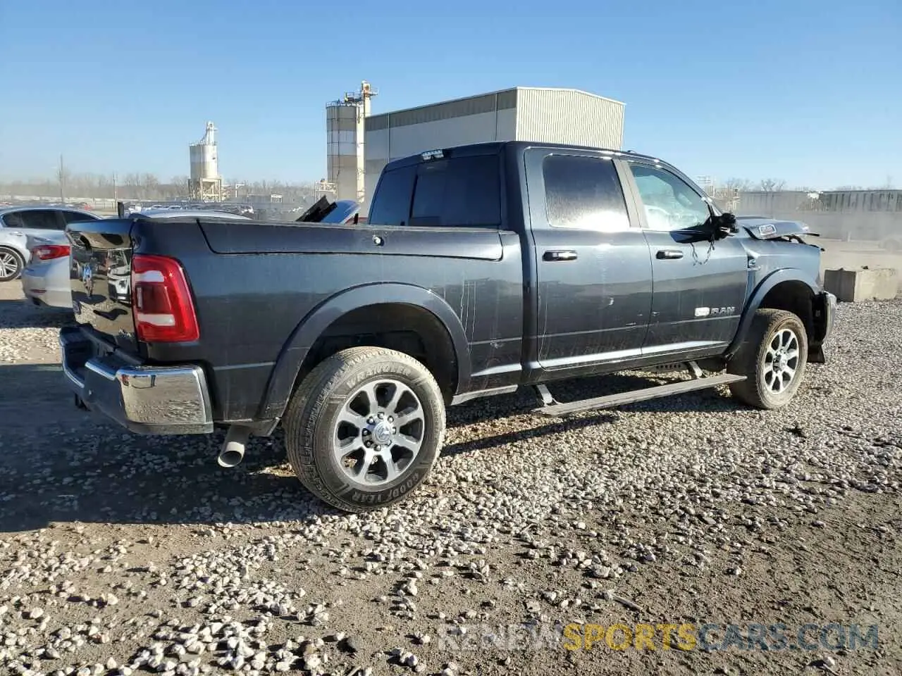 3 Photograph of a damaged car 3C6UR5GL8MG582023 RAM 2500 2021