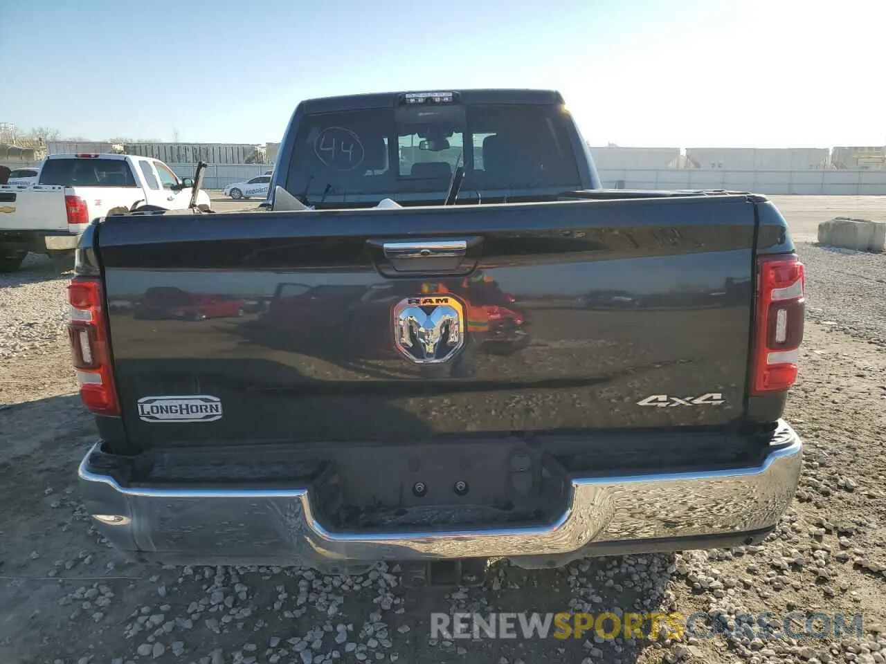 6 Photograph of a damaged car 3C6UR5GL8MG582023 RAM 2500 2021