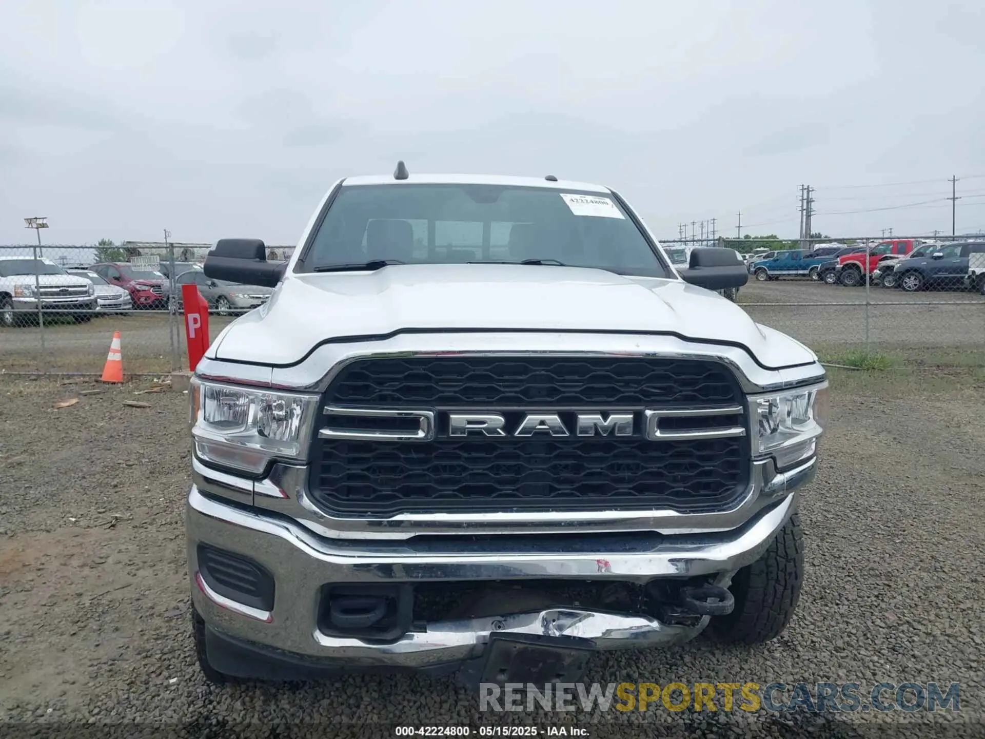 12 Photograph of a damaged car 3C6UR5HJ1MG560703 RAM 2500 2021