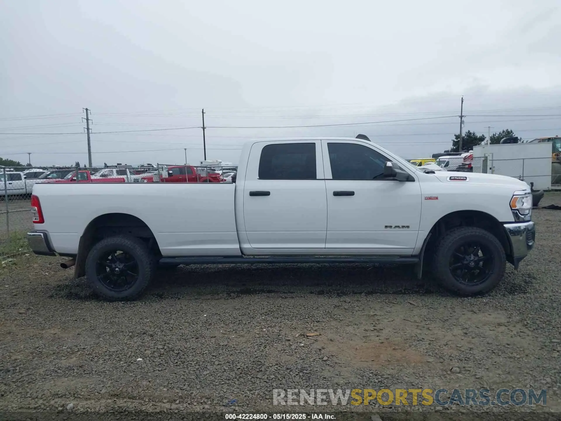 13 Photograph of a damaged car 3C6UR5HJ1MG560703 RAM 2500 2021