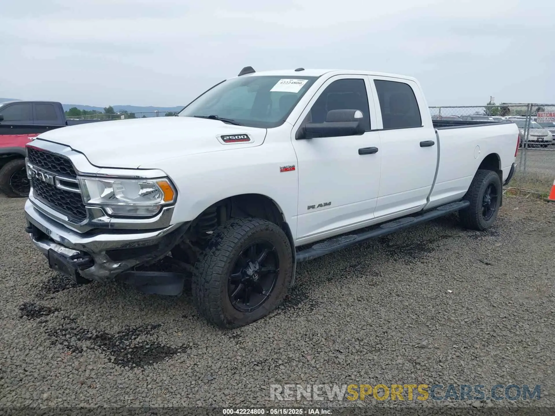 2 Photograph of a damaged car 3C6UR5HJ1MG560703 RAM 2500 2021