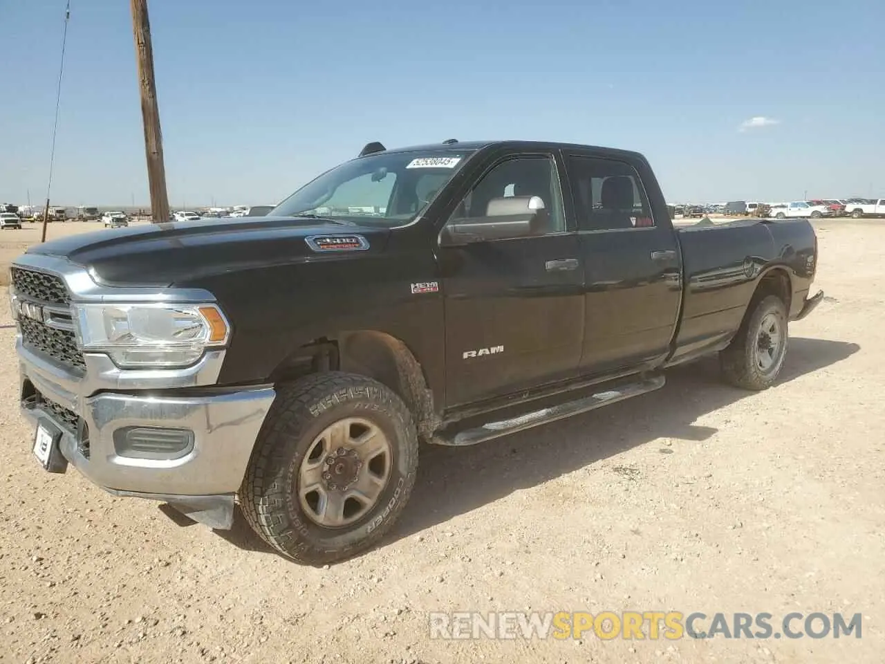 1 Photograph of a damaged car 3C6UR5HJ2MG675617 RAM 2500 2021