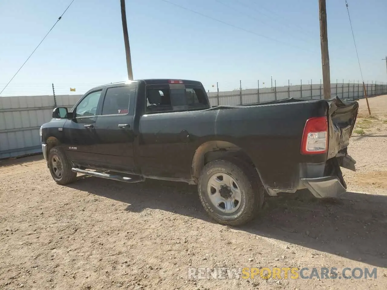 2 Photograph of a damaged car 3C6UR5HJ2MG675617 RAM 2500 2021
