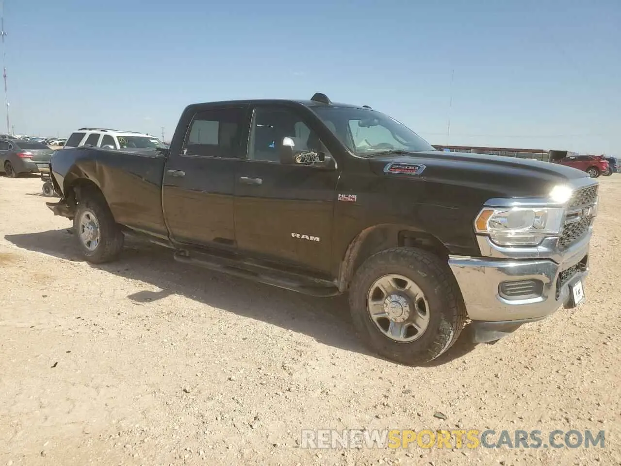 4 Photograph of a damaged car 3C6UR5HJ2MG675617 RAM 2500 2021