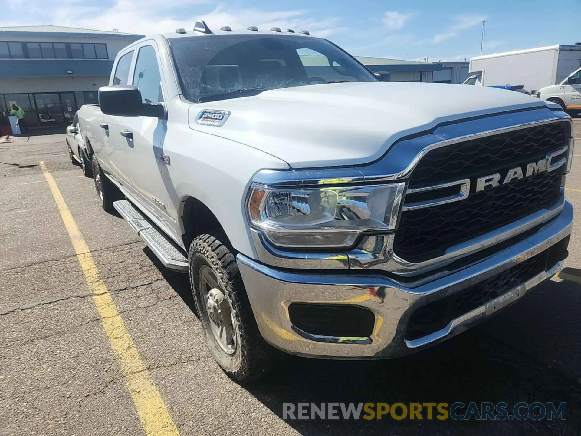 2 Photograph of a damaged car 3C6UR5HJ4MG585692 RAM 2500 2021